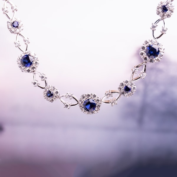 Miadora Sterling Silver Created Blue and White Sapphire Flower Necklace