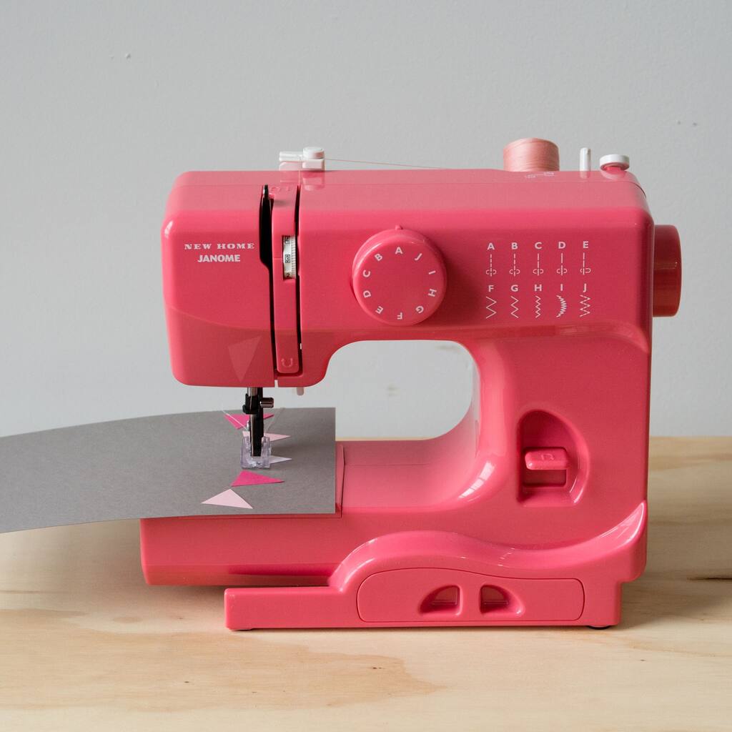 Janome Pink Lightning Basic, Easy-to-Use, 10-stitch Portable, 5 lb Compact Sewing Machine with Free Arm