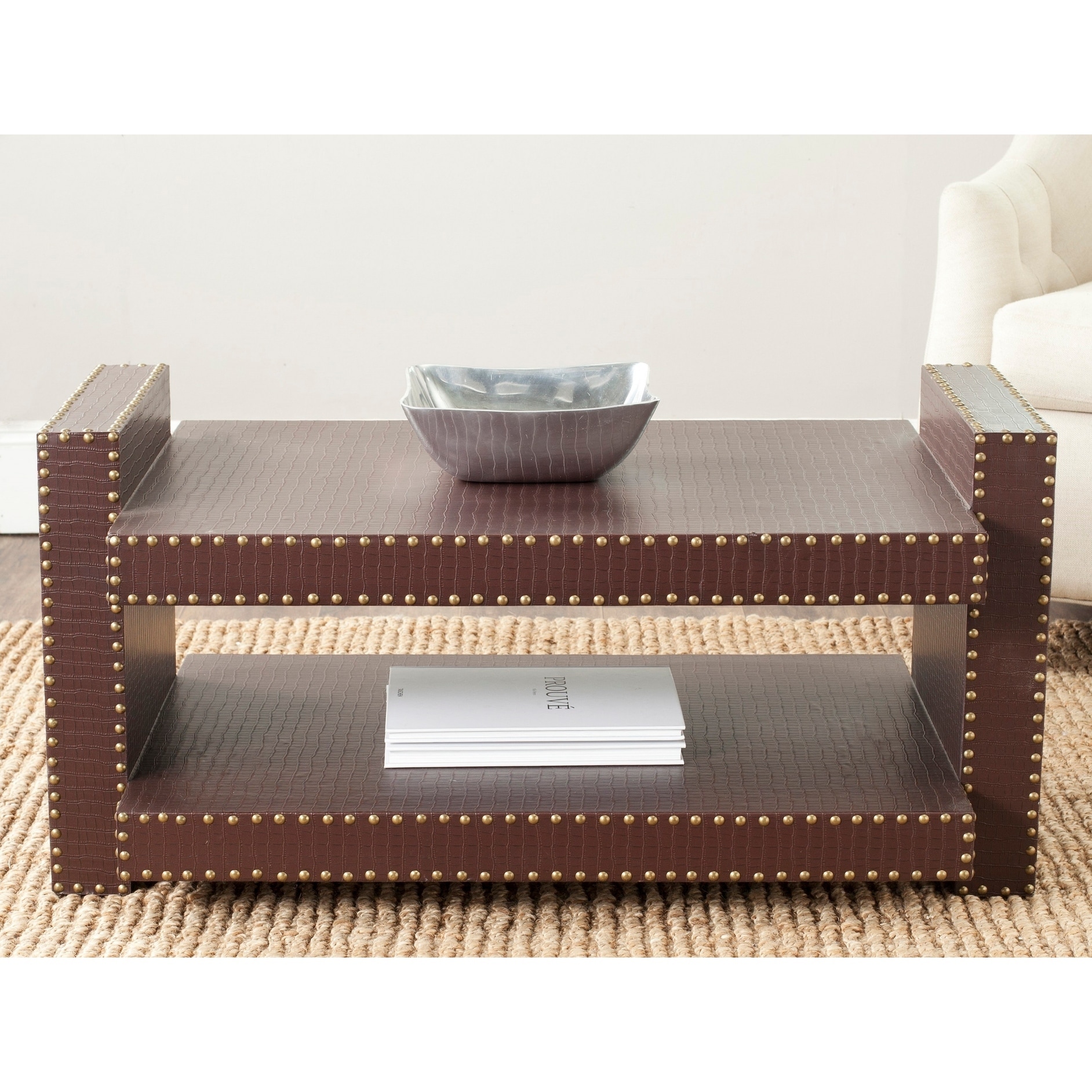 Safavieh Garson Brown Crocodile Coffee Table (BrownMaterials Iron, MDF and PUFinish BrownDimensions 18.9 inches high x 39.37 inches wide x 23.62 inches deepThis product will ship to you in 1 box.Furniture arrives fully assembled )