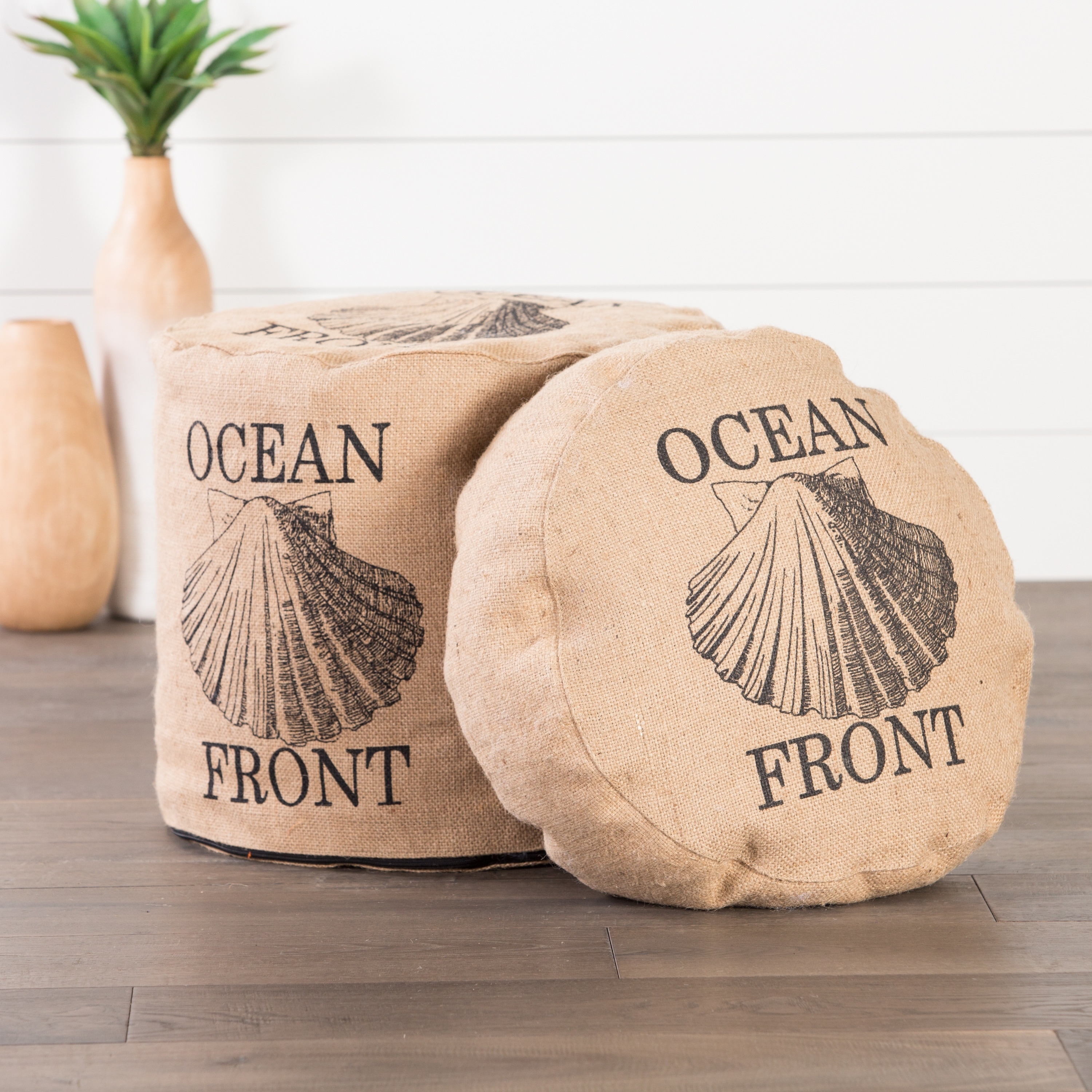 Modern Tan/ Black 18 inch Cylindrical Jute Pouf (JuteFinish KnifeUpholstery color Tan/blackUpholstery fill JuteWeight capacity 265 poundsSeat dimensions 18 inches x 18 inchesOttoman dimensions 18 inches x 18 inches x 6 inchesThe digital images we dis