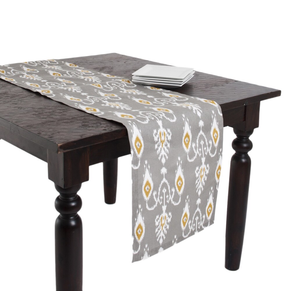 grey and yellow table runner