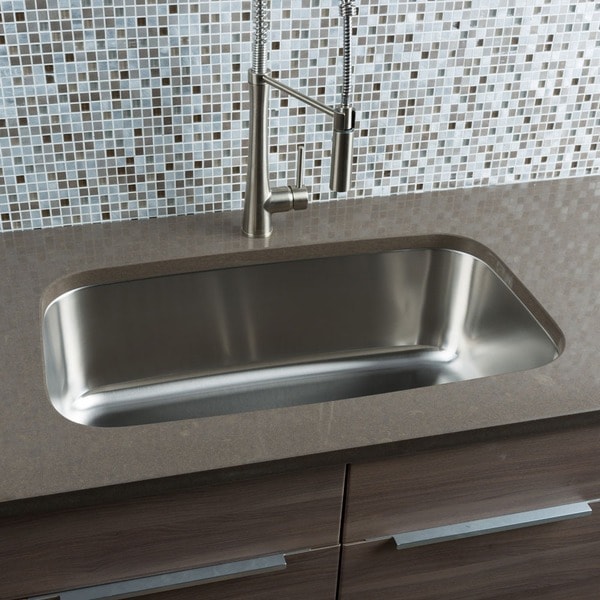 white kitchen shelves with darkish counter tops