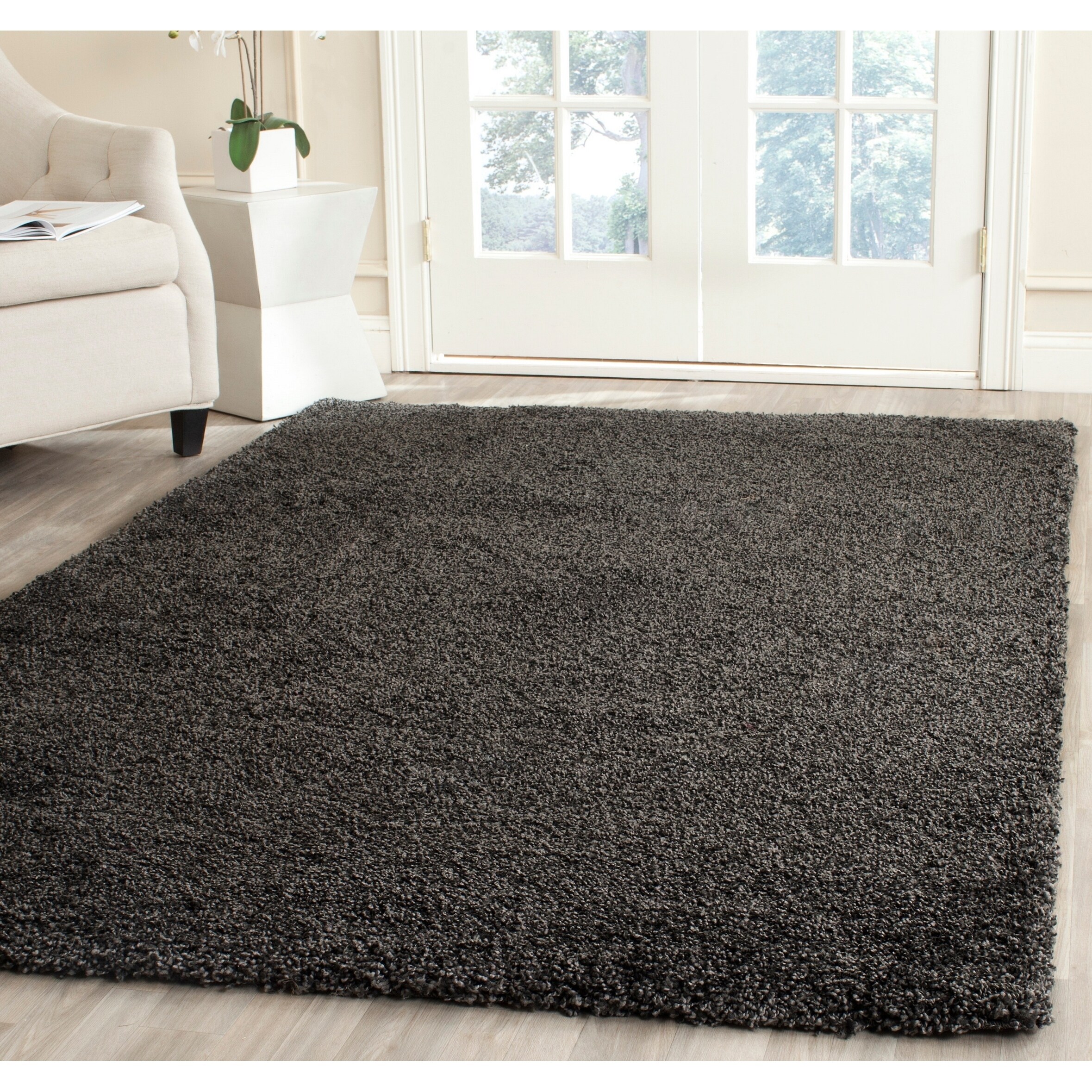 grey black shaggy rug