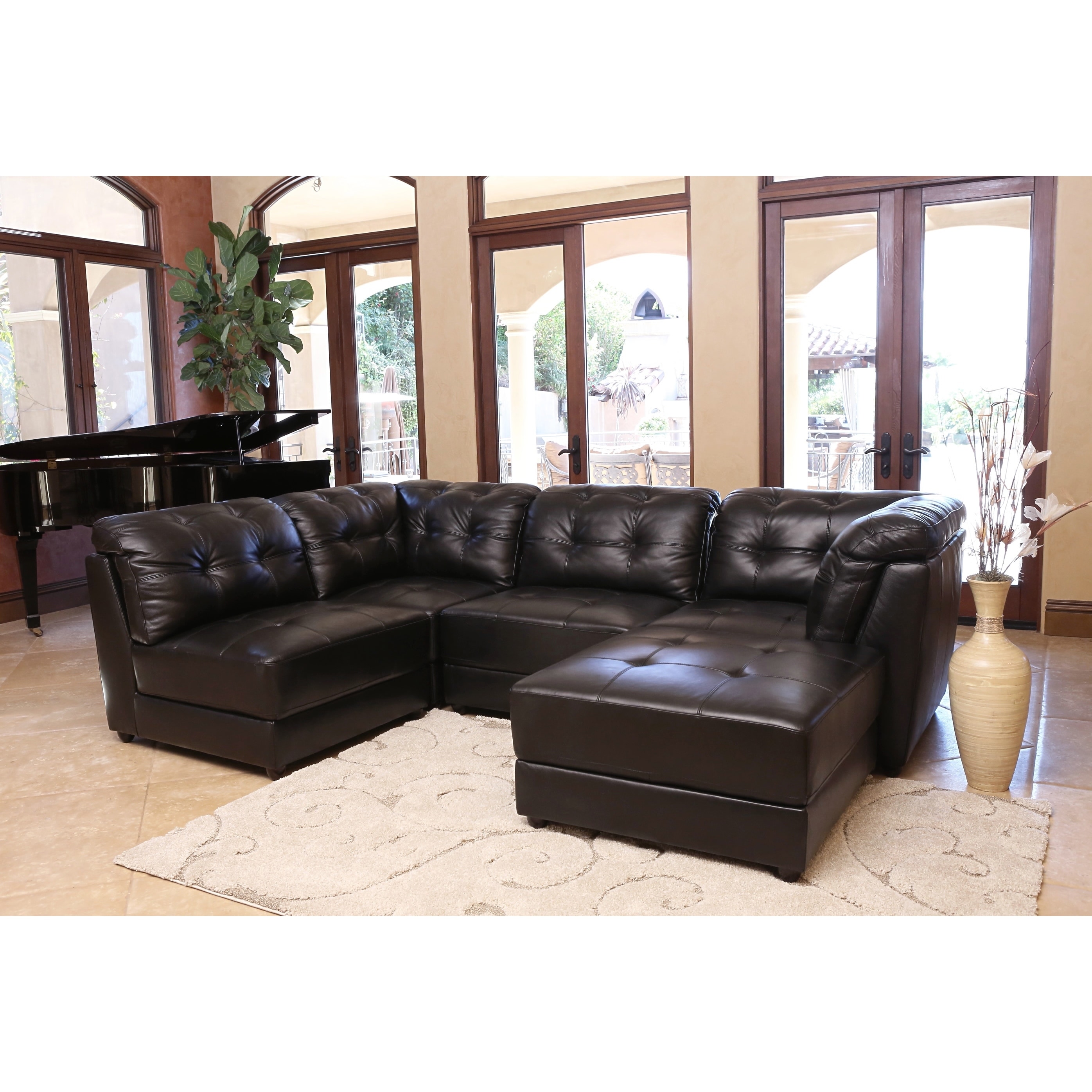 Abbyson Living Ella 5 piece Black Modular Italian Leather Sectional (BlackKiln dried hardwood framesHigh resiliency 2.2 density foam cushioning for added comfort and supportHand stitched detailsOverall Dimensions 115 inches wide x 40 inches deep x 35 inc