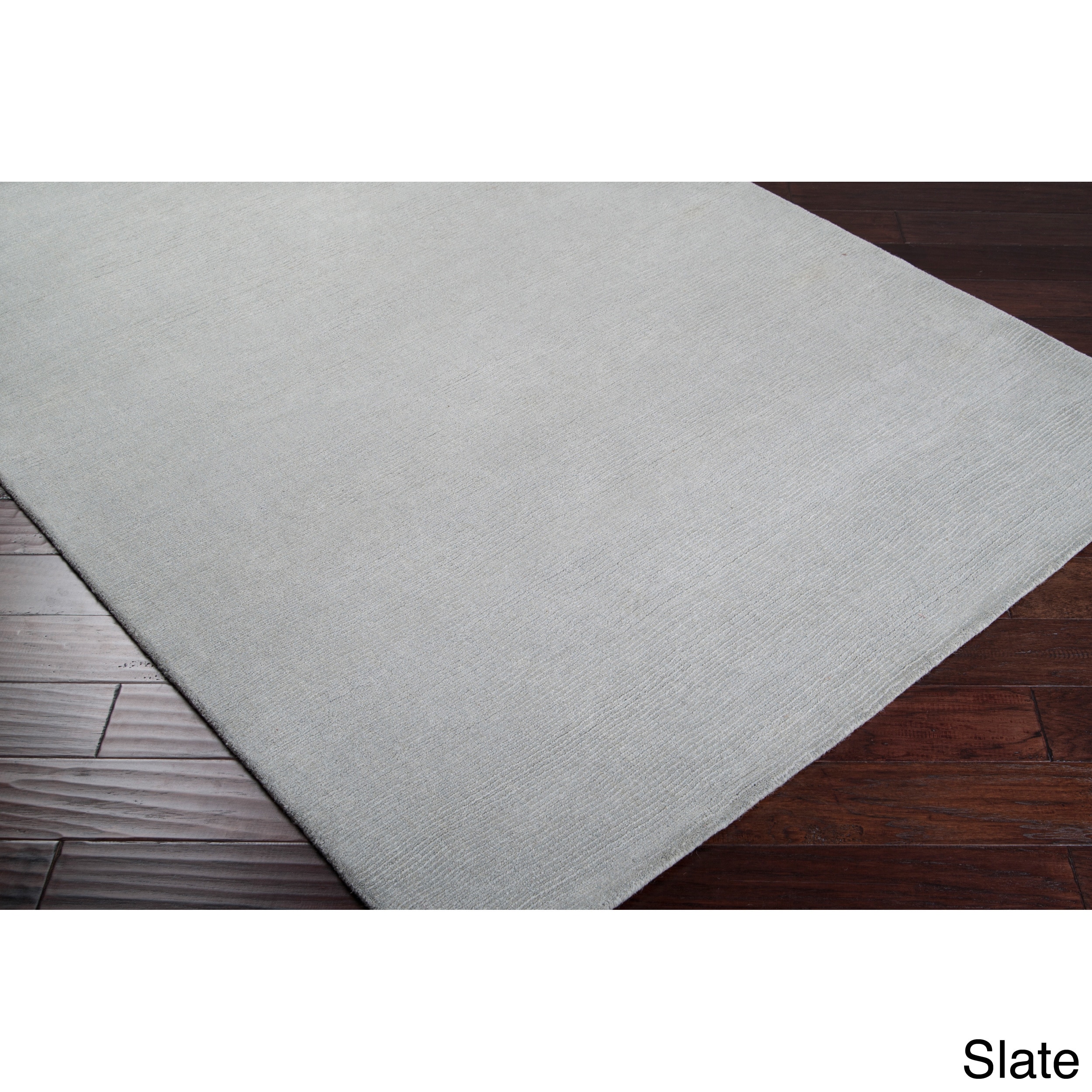 Hand loomed Jasper Solid Casual Area Rug (76 X 96)