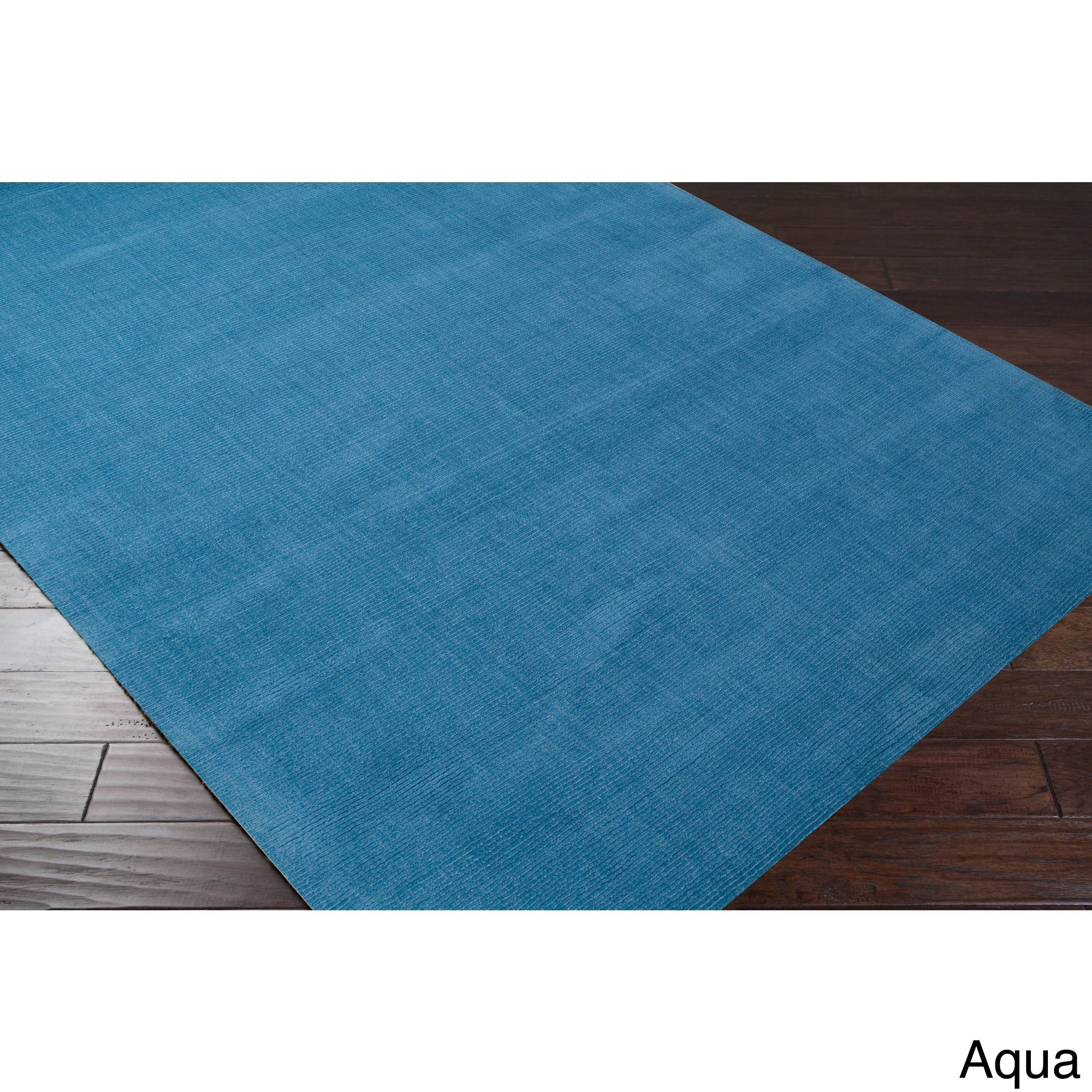 Hand loomed Torres Casual Solid Wool Area Rug (5 X 8)