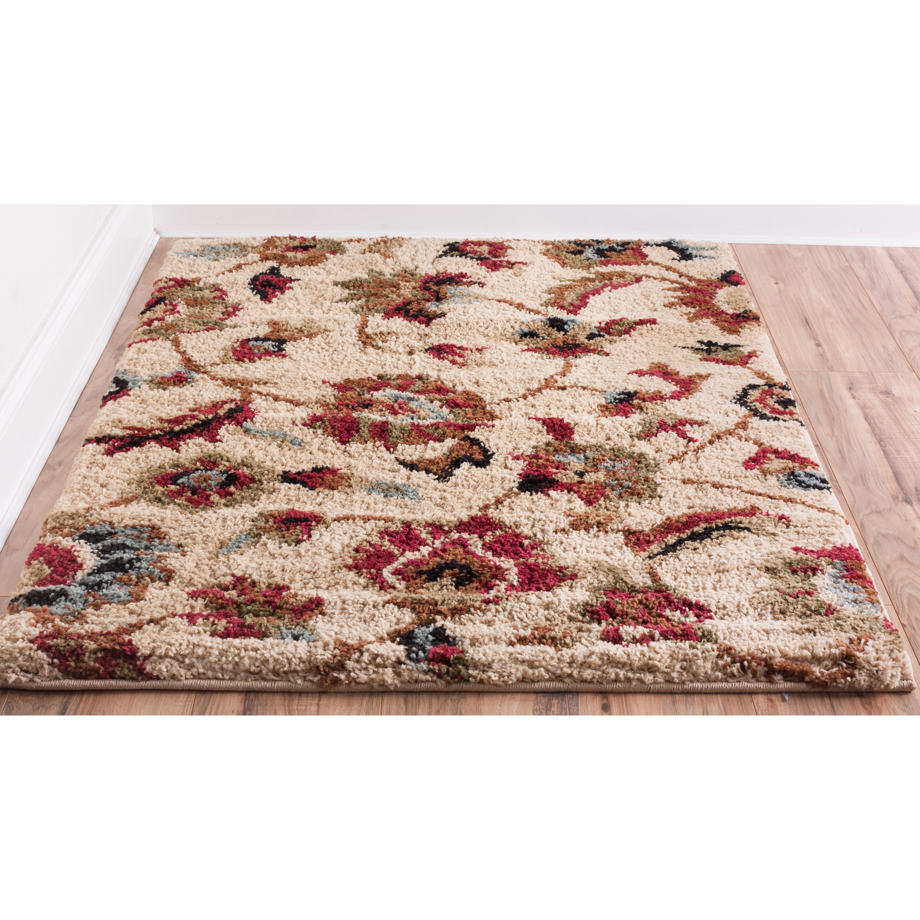 Cliffs Ivory Floral Shag Area Rug (5 X 7) (Air twist polypropyleneLatex NoConstruction Method Machine madePile Height 1.1 inchesStyle ContemporaryPrimary color IvorySecondary colors Red, Green, Blue, Olive, BlackPattern AbstractTip We recommend th