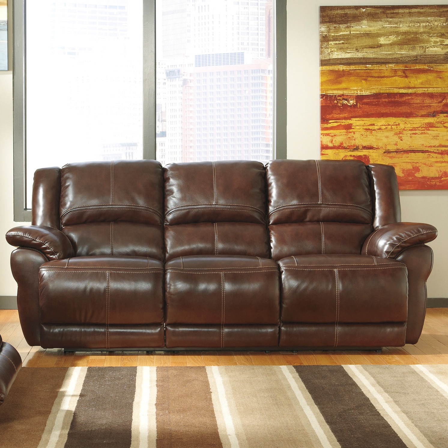 Signature Designs By Ashley Lenoris Coffee Reclining Power Sofa