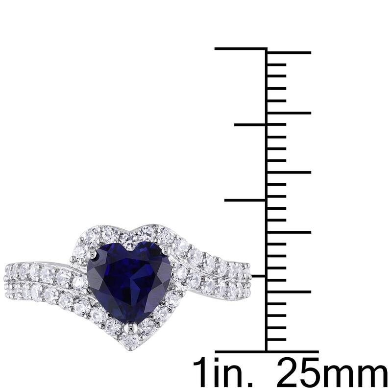 Miadora Sterling Silver Created White and Blue Sapphire Heart Halo Crossover Ring