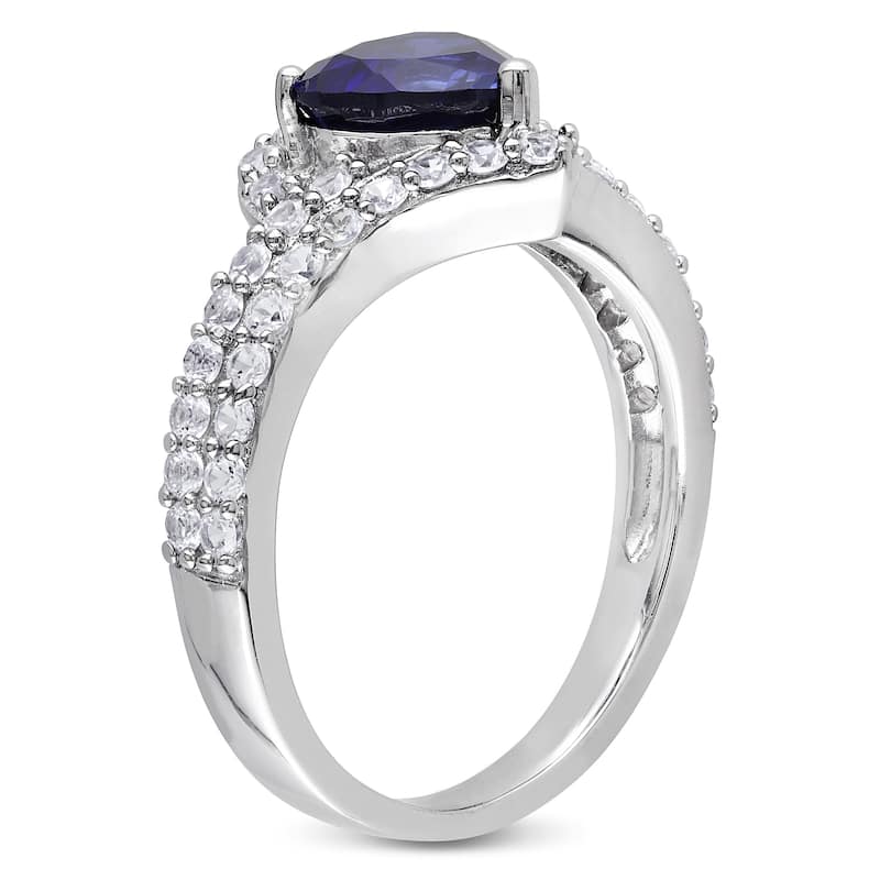 Miadora Sterling Silver Created White and Blue Sapphire Heart Halo Crossover Ring
