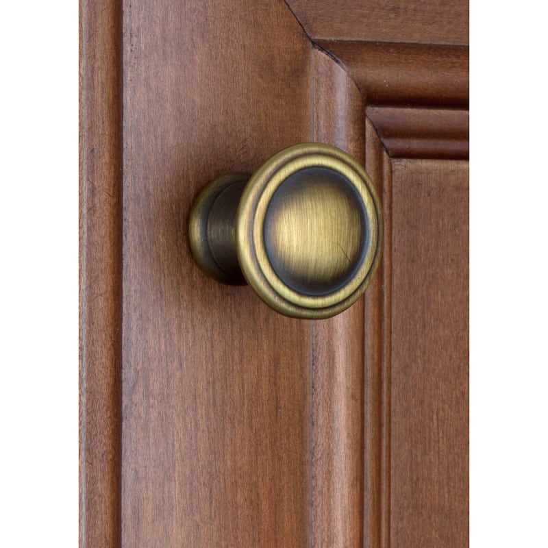 GlideRite 1.25-inch Antique Brass Round Deco Cabinet Knobs (Pack of 10)