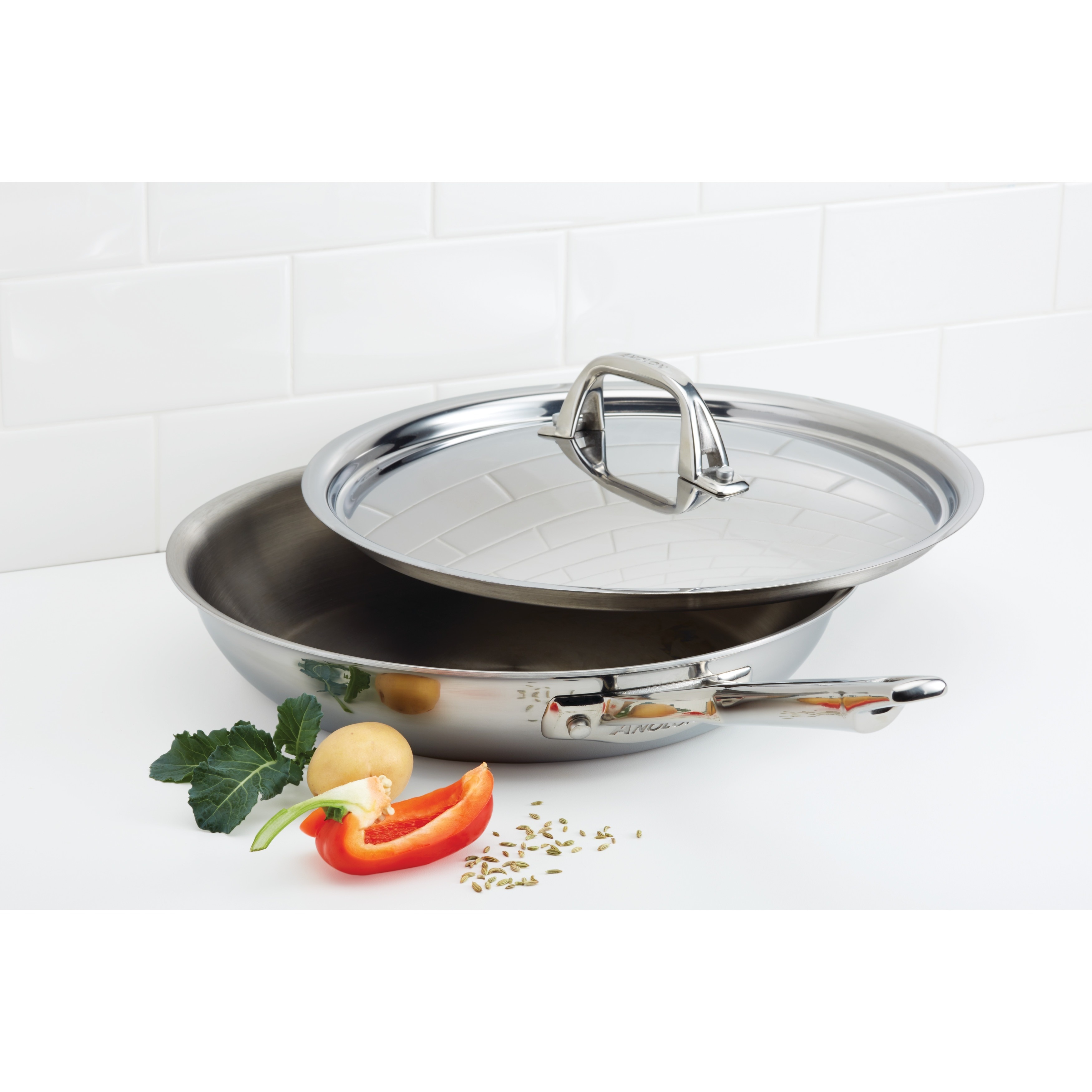 https://ak1.ostkcdn.com/images/products/9206704/Anolon-Tri-ply-Clad-Stainless-Steel-12-3-4-inch-Covered-Skillet-a74bfc5c-0aea-46e5-87e9-4bb2418d1b8a.jpg