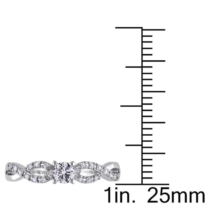 Miadora 10k White Gold Created White Sapphire and 1/10ct TDW Diamond Crossover Engagement Ring (H-I,