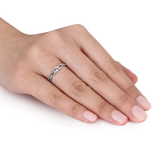 Miadora 10k White Gold Created White Sapphire and 1/10ct TDW Diamond Crossover Engagement Ring (H-I,