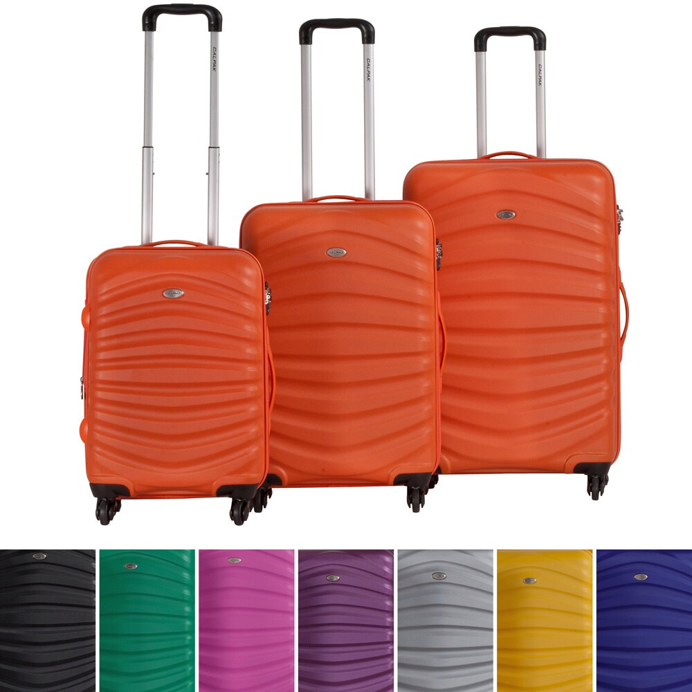 calpak orange luggage