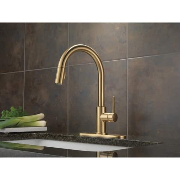 slide 1 of 10, Delta Trinsic Single Handle Pull-Down Kitchen Faucet 9159-CZ-DST Champagne Bronze