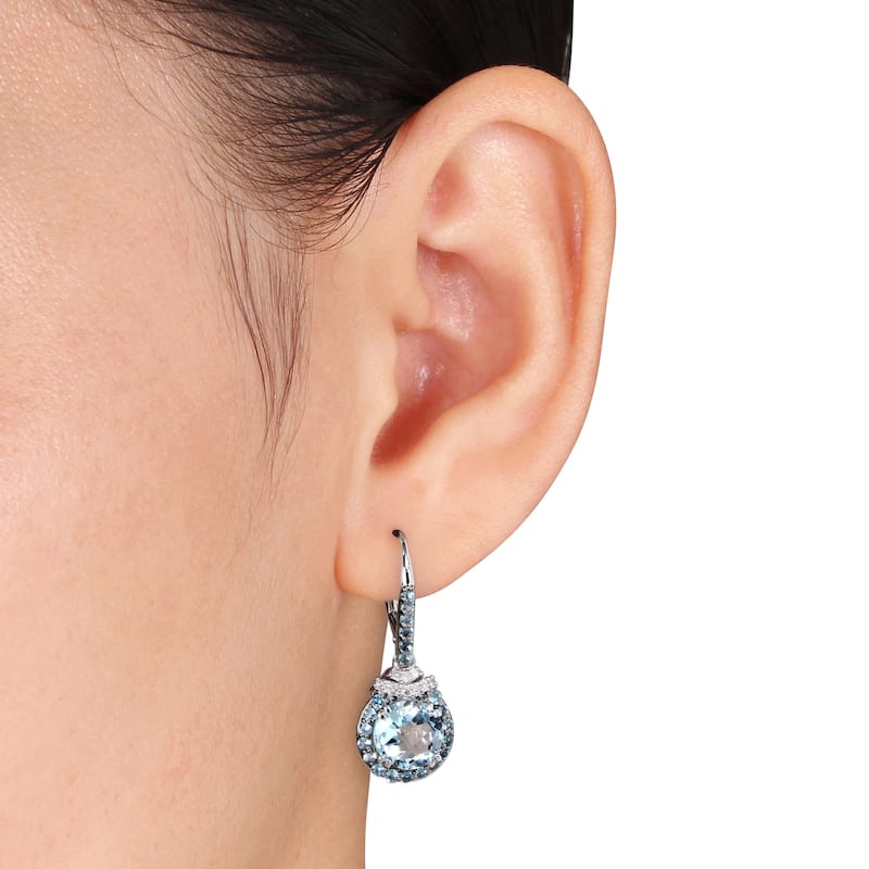 Miadora Sterling Silver Blue Topaz and 1/10ct Diamond Dangle Earrings (H-I, I2-I3)