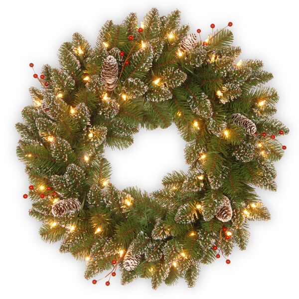 24-inch Glittery Mountain Spruce Wreath with White Edged Cones, Red Berries and Lights. Opens flyout.
