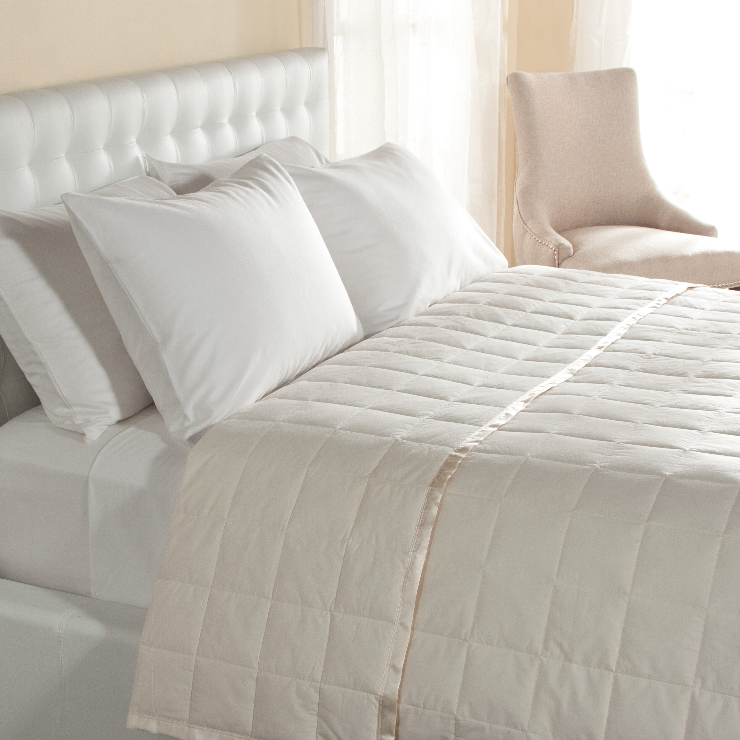 white blanket with satin trim