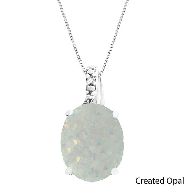 Oval Gemstone Birthstone Pendant in Sterling Silver with Diamond Accent Necklace. Opens flyout.