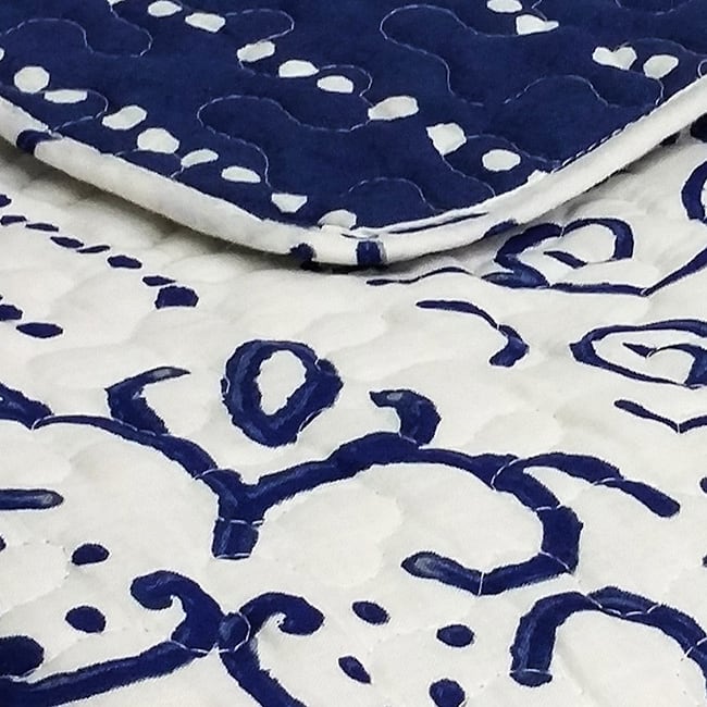The Curated Nomad Carnation Throw Blanket
