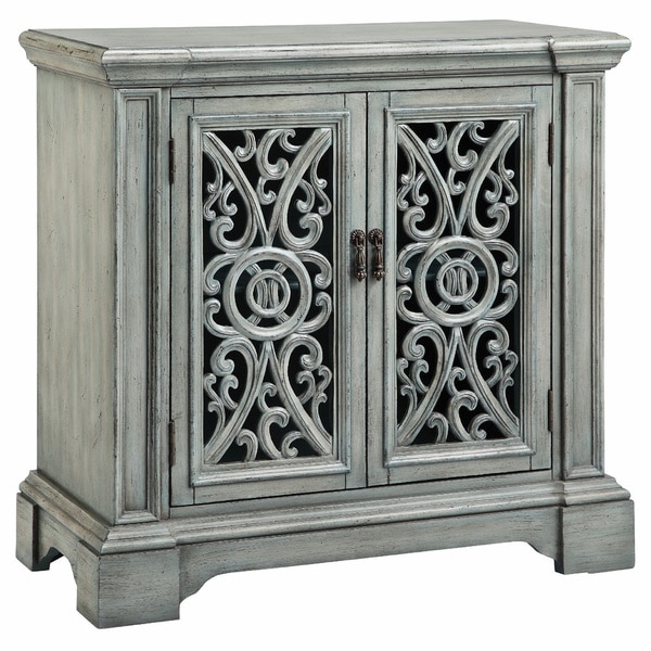 carved entryway cabinet