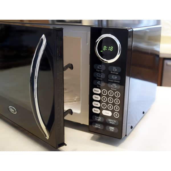 Shop Oster Black 0 9 Cubic Foot Digital Microwave Oven Free