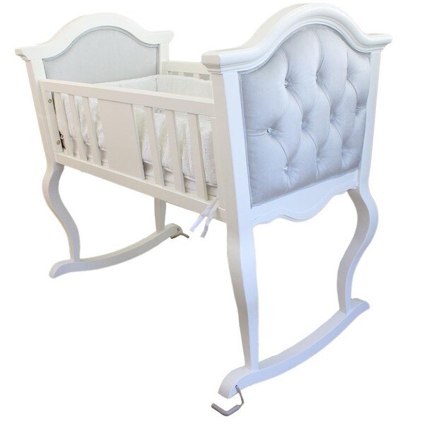 white rocking bassinet