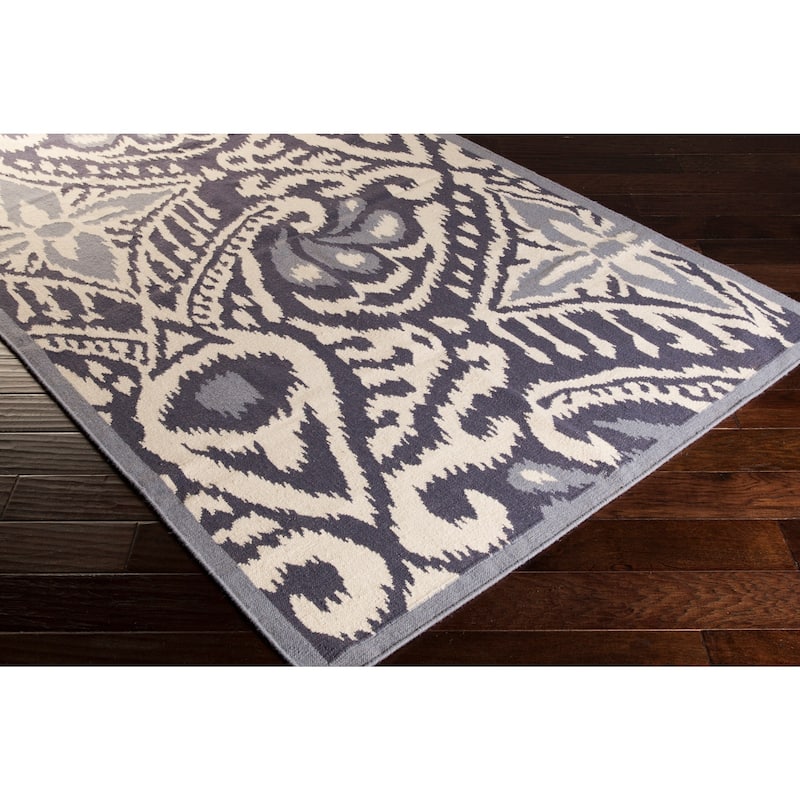 Hand-woven Cailyn Ikat Reversible Area Rug