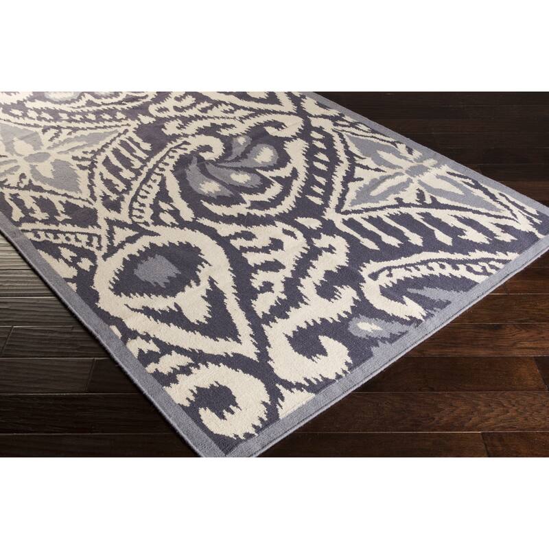 Hand-woven Cailyn Ikat Reversible Area Rug