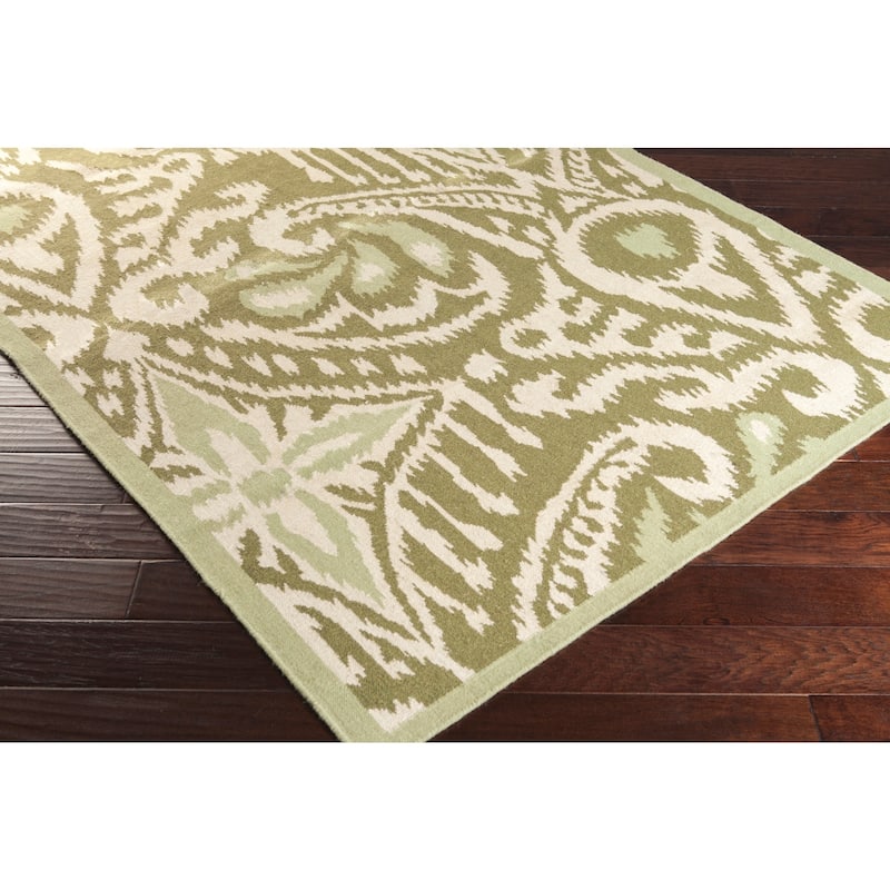 Hand-woven Cailyn Ikat Reversible Area Rug