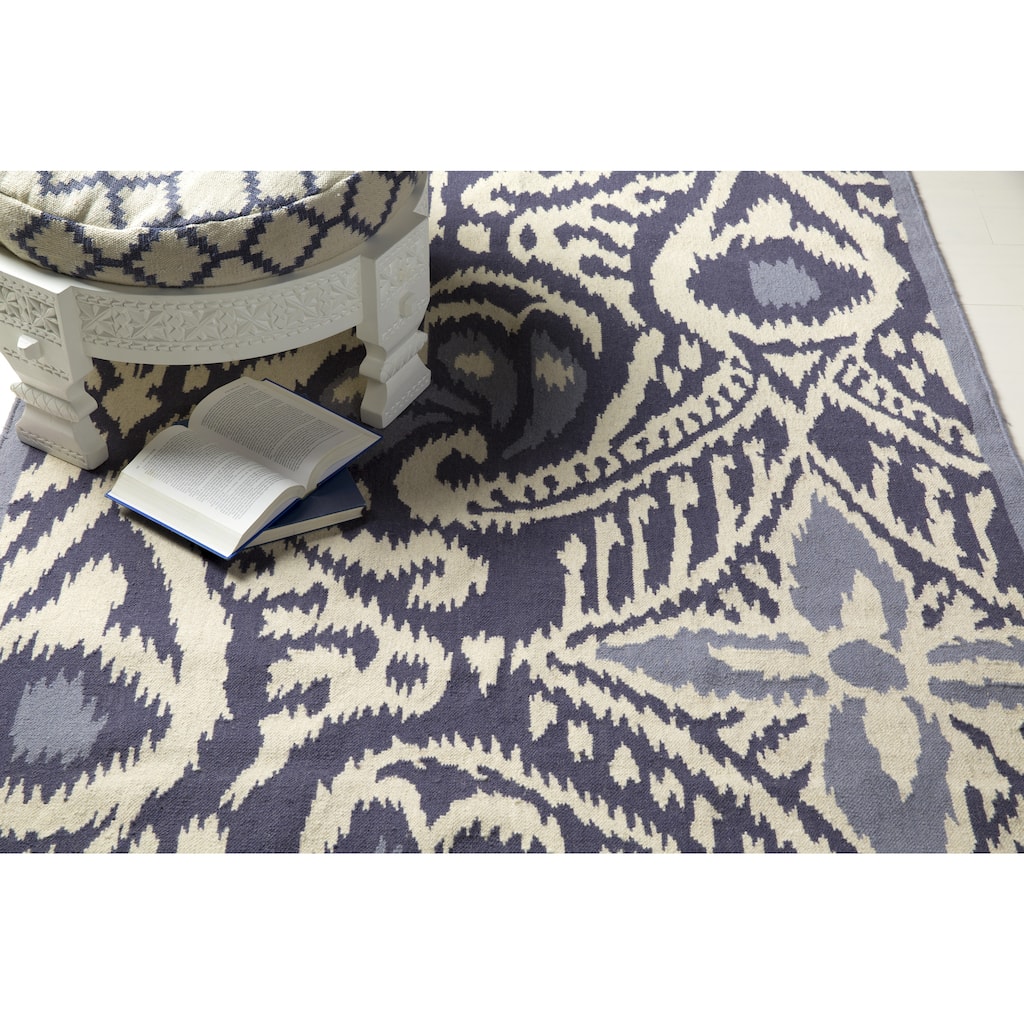 Hand-woven Cailyn Ikat Reversible Area Rug