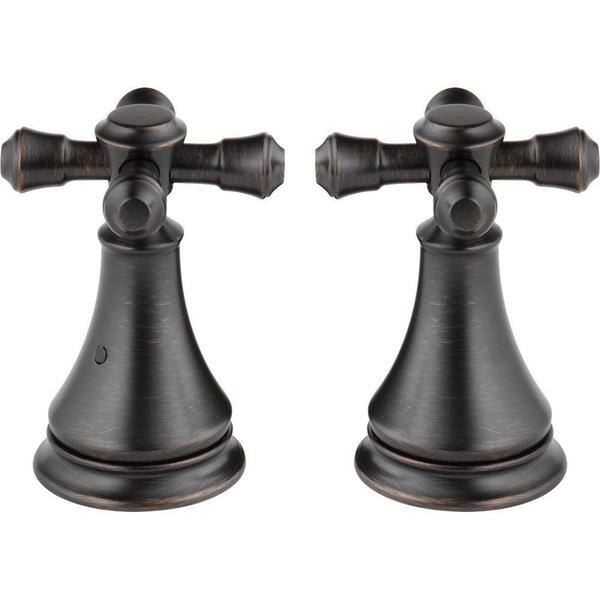 This tub handle kit features a bronze finish with brass