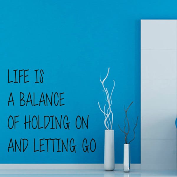 Torn between letting go and holding on image