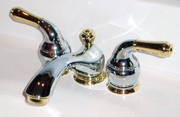 silver bathroom sink faucet