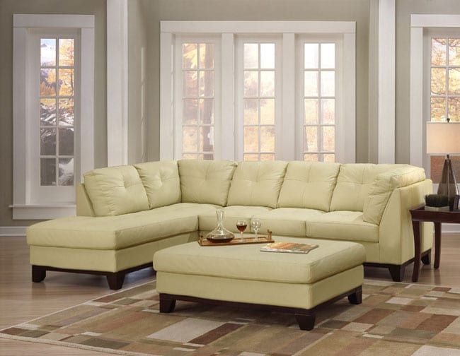 Tufted Leather Sectional Sofa and Large Ottoman  