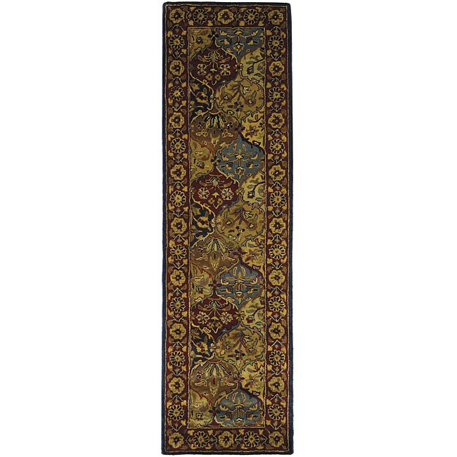 Handmade Heritage Bakhtiari Multi/ Navy Wool Runner (23 X 14) (MultiPattern OrientalMeasures 0.625 inch thickTip We recommend the use of a non skid pad to keep the rug in place on smooth surfaces.All rug sizes are approximate. Due to the difference of m