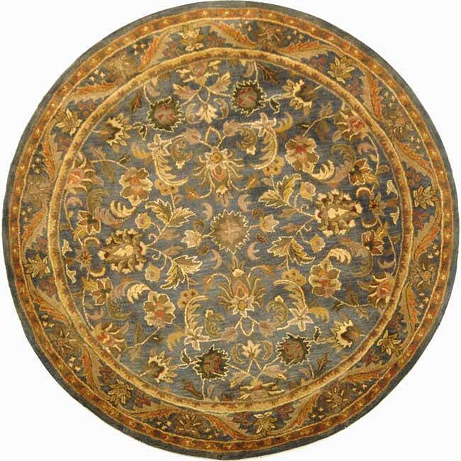 Handmade Exquisite Blue/ Gold Wool Rug (8 Round) (BluePattern OrientalMeasures 0.625 inch thickTip We recommend the use of a non skid pad to keep the rug in place on smooth surfaces.All rug sizes are approximate. Due to the difference of monitor colors,