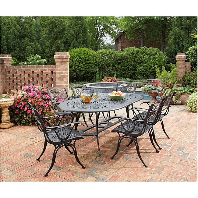 Home Styles Malibu Cast Aluminum Black 7 piece Outdoor Dining Set (BlackMaterials Cast aluminum Finish AntiqueWeather resistant YesUV protectionAdjustable, nylon glides Powder coatedHand applied antique finishDesigned to prevent damage from poolingCent