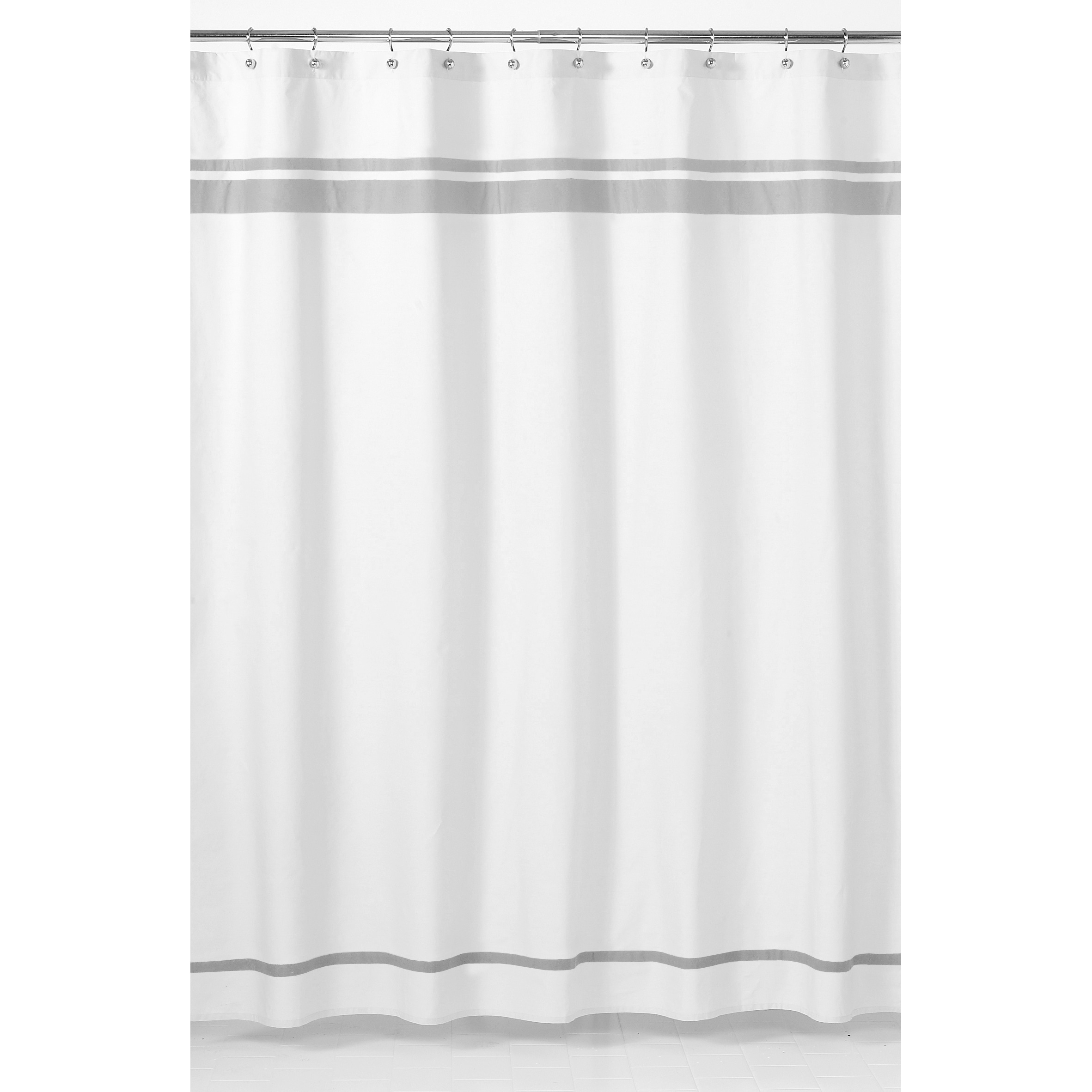 gray and white shower curtain with fringe
