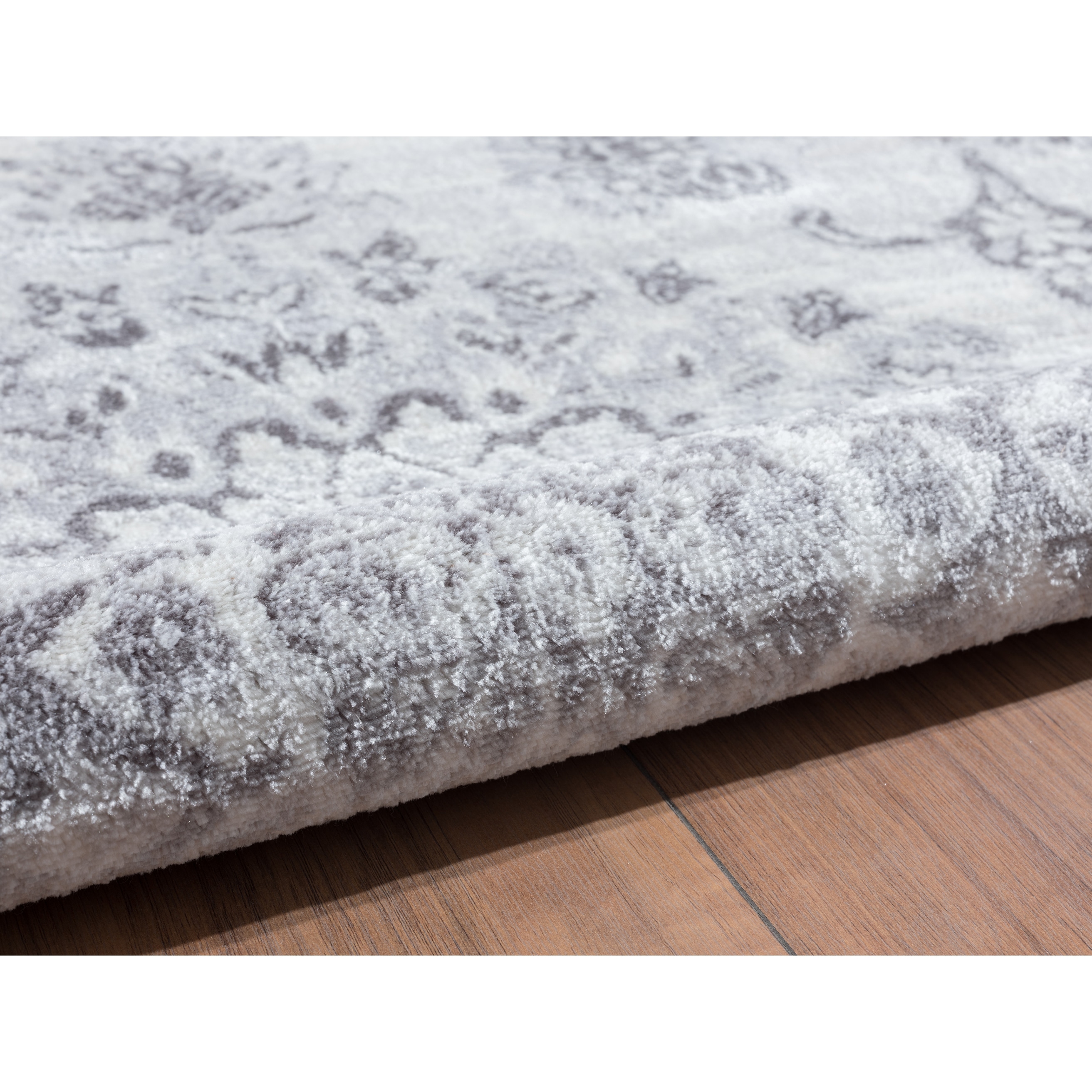 https://ak1.ostkcdn.com/images/products/is/images/direct/0025c9b4369550092b7cdb50fc29a2f84e9c6788/Serafina-Home-Gray-Rug.jpg