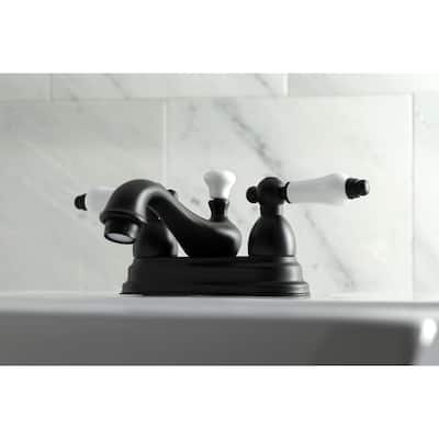 Kingston Brass Restoration Two-Handle 3-Hole Deck Mount 4 in. Centerset Bathroom Faucet