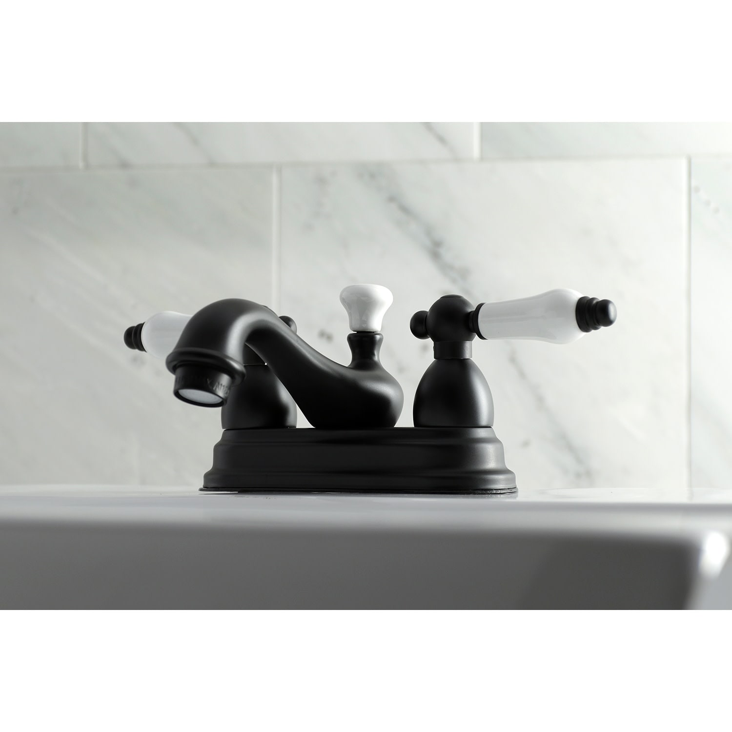Kingston Brass Restoration Two-Handle 3-Hole Deck Mount 4 in. Centerset Bathroom Faucet