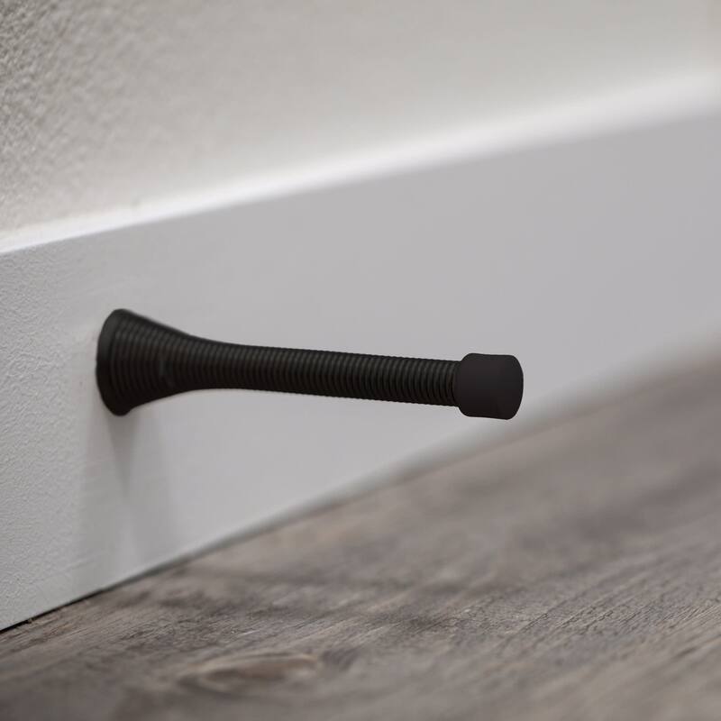 Design House 188193 3-1/8" Baseboard Mounted Spring Door Stop