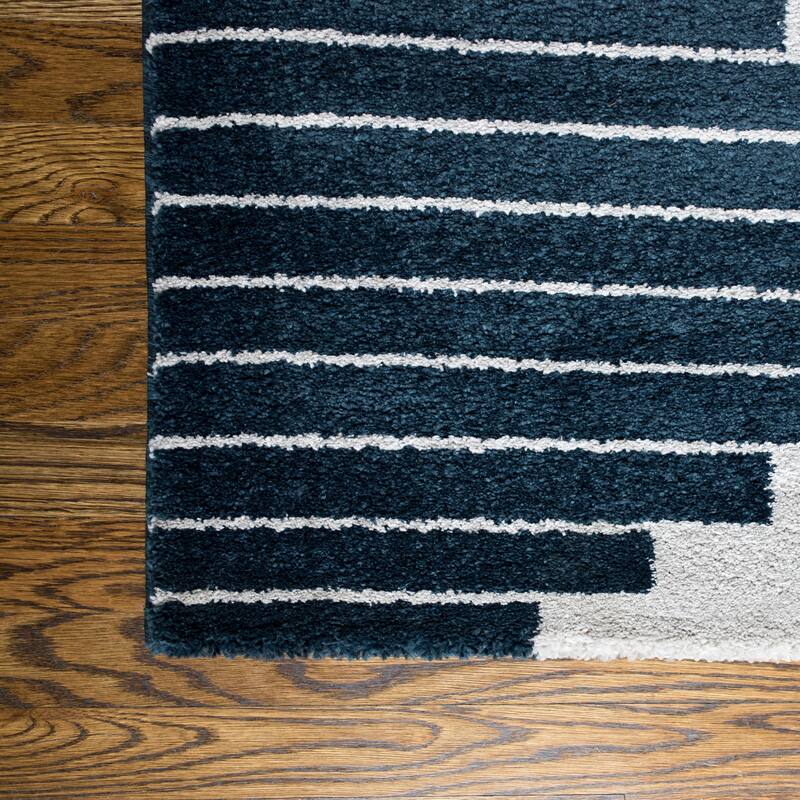 Carson Carrington Salsaker Geometric Area Rug