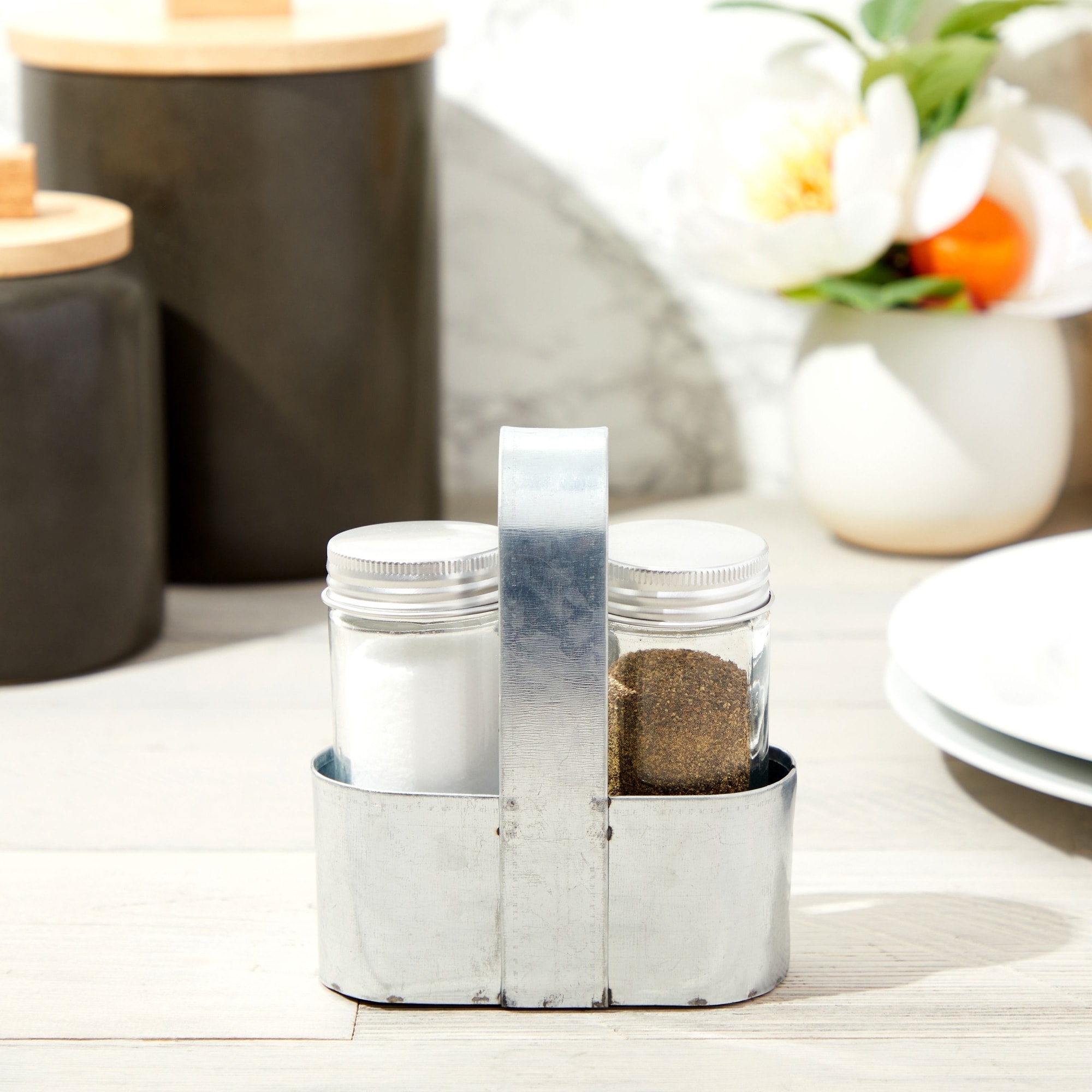 https://ak1.ostkcdn.com/images/products/is/images/direct/0097464e34b7a870998331e4528b7032e22fd59e/Rustic%C2%A0Farmhouse-Salt-and-Pepper-Shakers%C2%A0with-Caddy-%283-Piece-Set%29.jpg