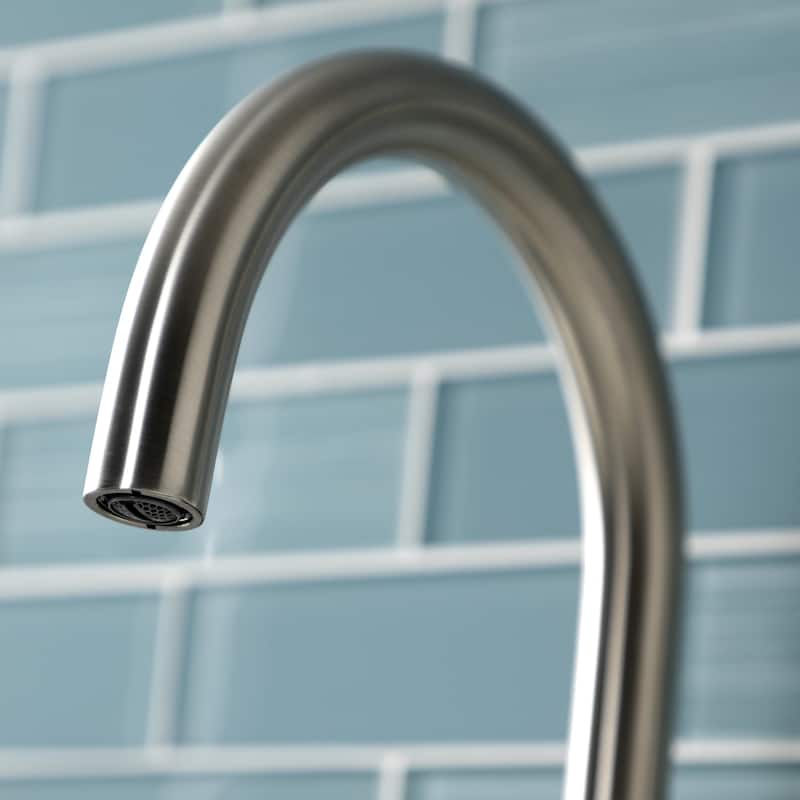 Kingston Brass Constantine Two-Handle 1-Hole Deck Mount Bathroom Faucet with Push Pop-Up