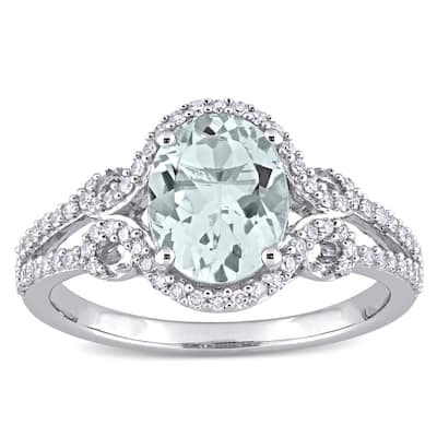 Miadora 10k White Gold Oval-cut Aquamarine and 1/3ct TDW Diamond Halo Split Shank Engagement Ring
