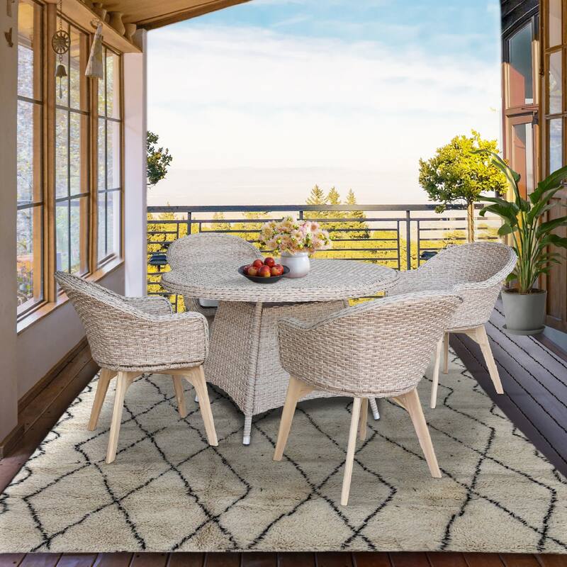 Outdoor Wicker Patio Furniture Set with a Round Table and Chairs