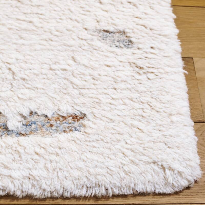 SAFAVIEH Handmade Casablanca Shag Dangira Wool High-Low Pile Rug